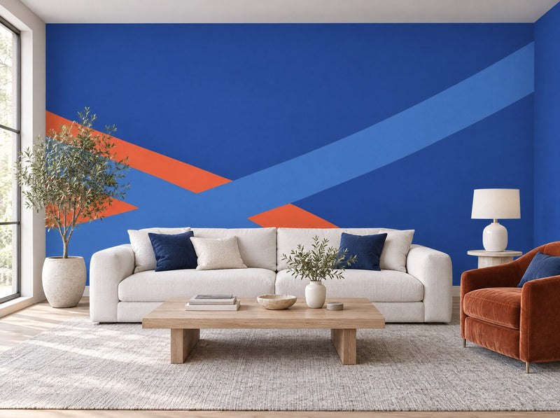 Papier peint bandes bleu et orange posé dans un salon