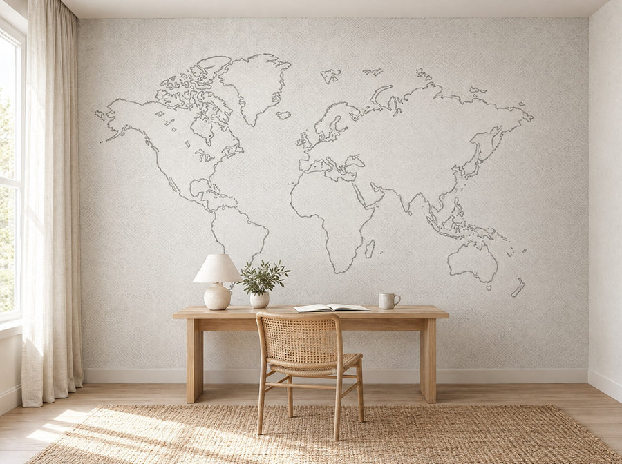 Papier peint carte du monde esquissée posé dans un bureau