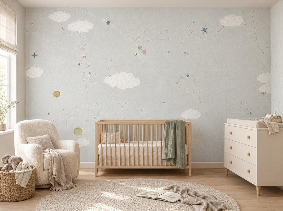 Papier peint ciel étoilé pastel posé dans une chambre de bébé