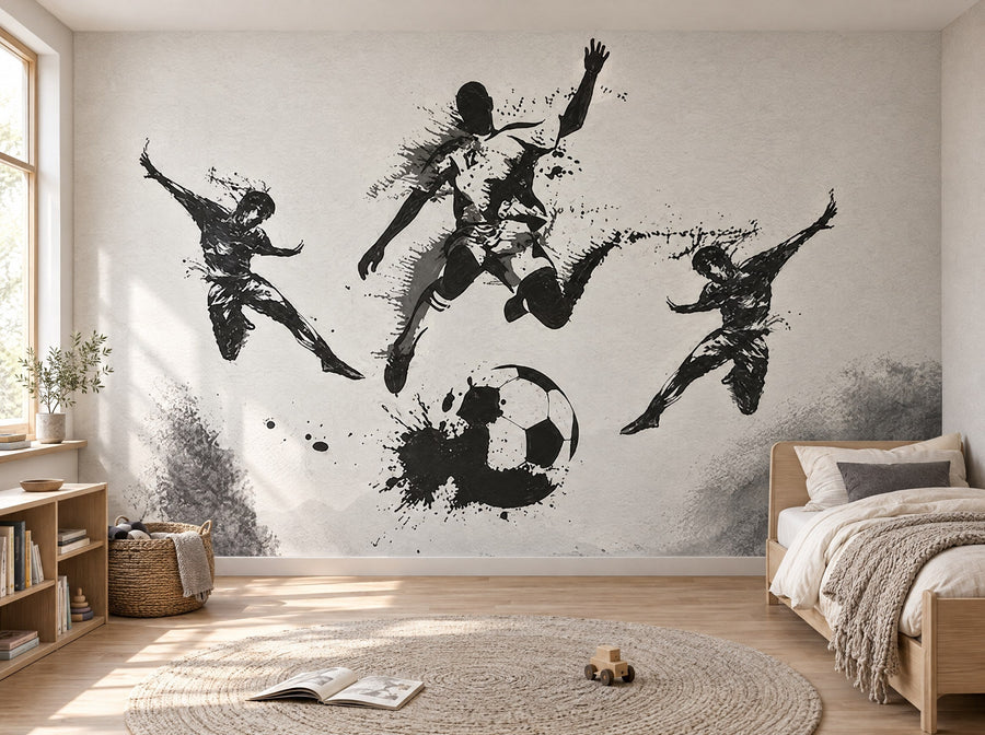 Papier peint footballeurs noir et blanc posé dans une chambre d'enfant
