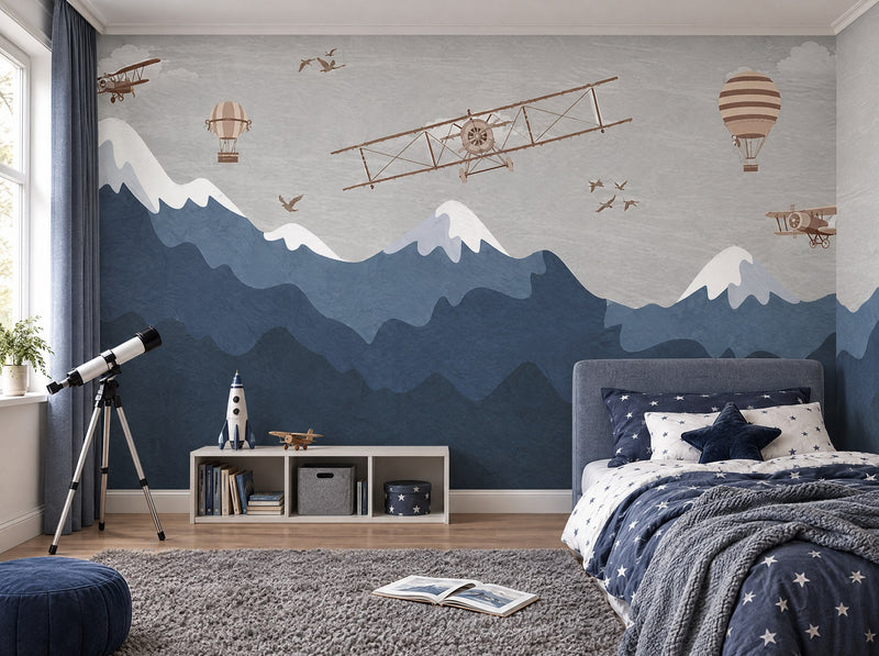 Papier peint montagnes et avions posé dans une chambre d'enfant