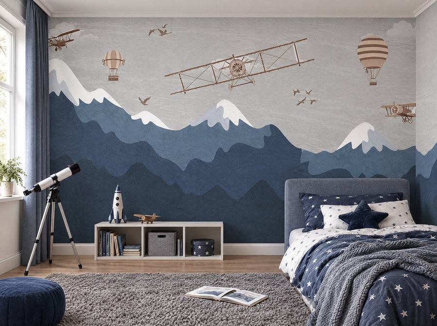 Papier peint montagnes et avions posé dans une chambre d'enfant