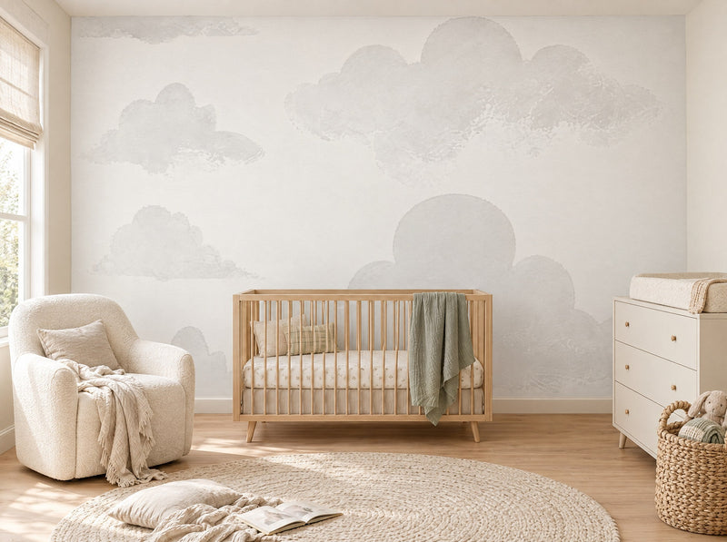 Papier peint nuages blancs posé dans une chambre de bébé